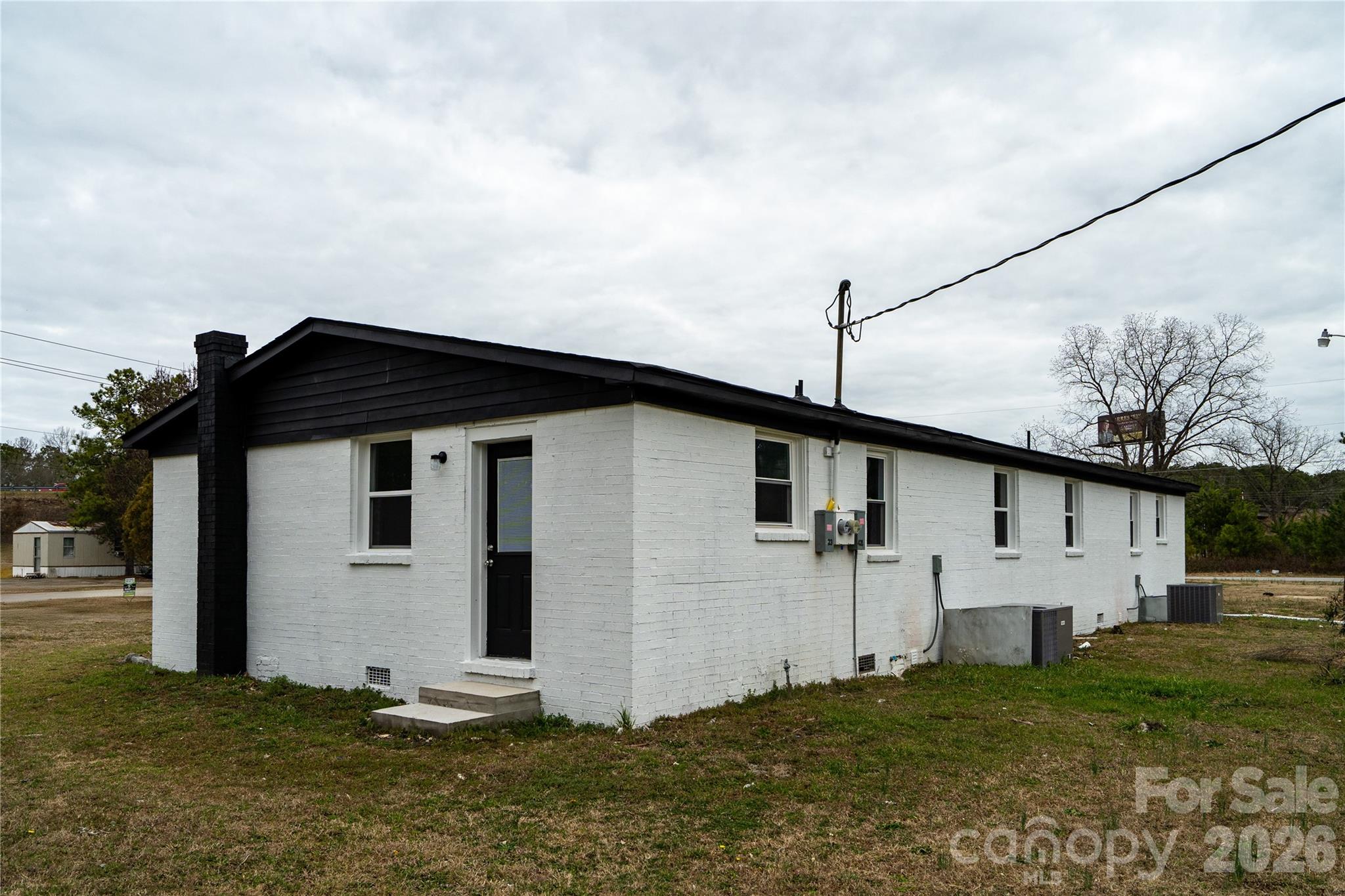 421 Pineville Road Darlington, SC 29532 - Photo 6 of 36 a view of a house with backyard