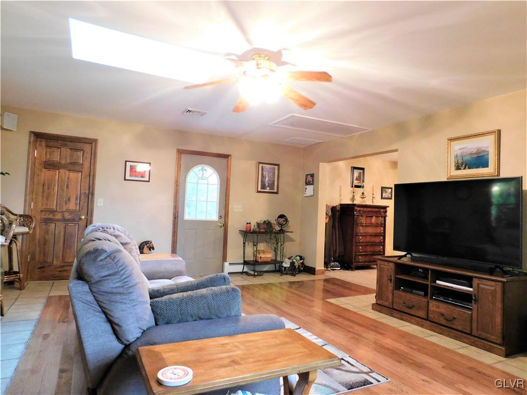 1123 Bangor Road Nazareth, PA 18064 - Photo 28 of 49 a living room with furniture and a flat screen tv