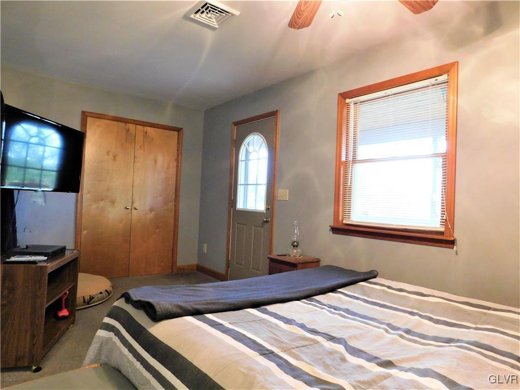 1123 Bangor Road Nazareth, PA 18064 - Photo 33 of 49 a bedroom with a bed and a flat screen tv