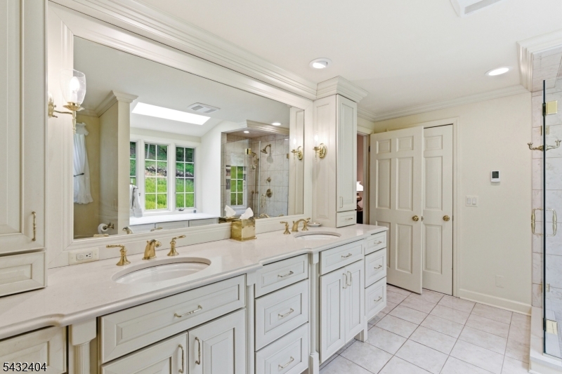 13 Hamden Road Flemington, NJ 08822 - Photo 27 of 37 a bathroom with double sink and a mirror