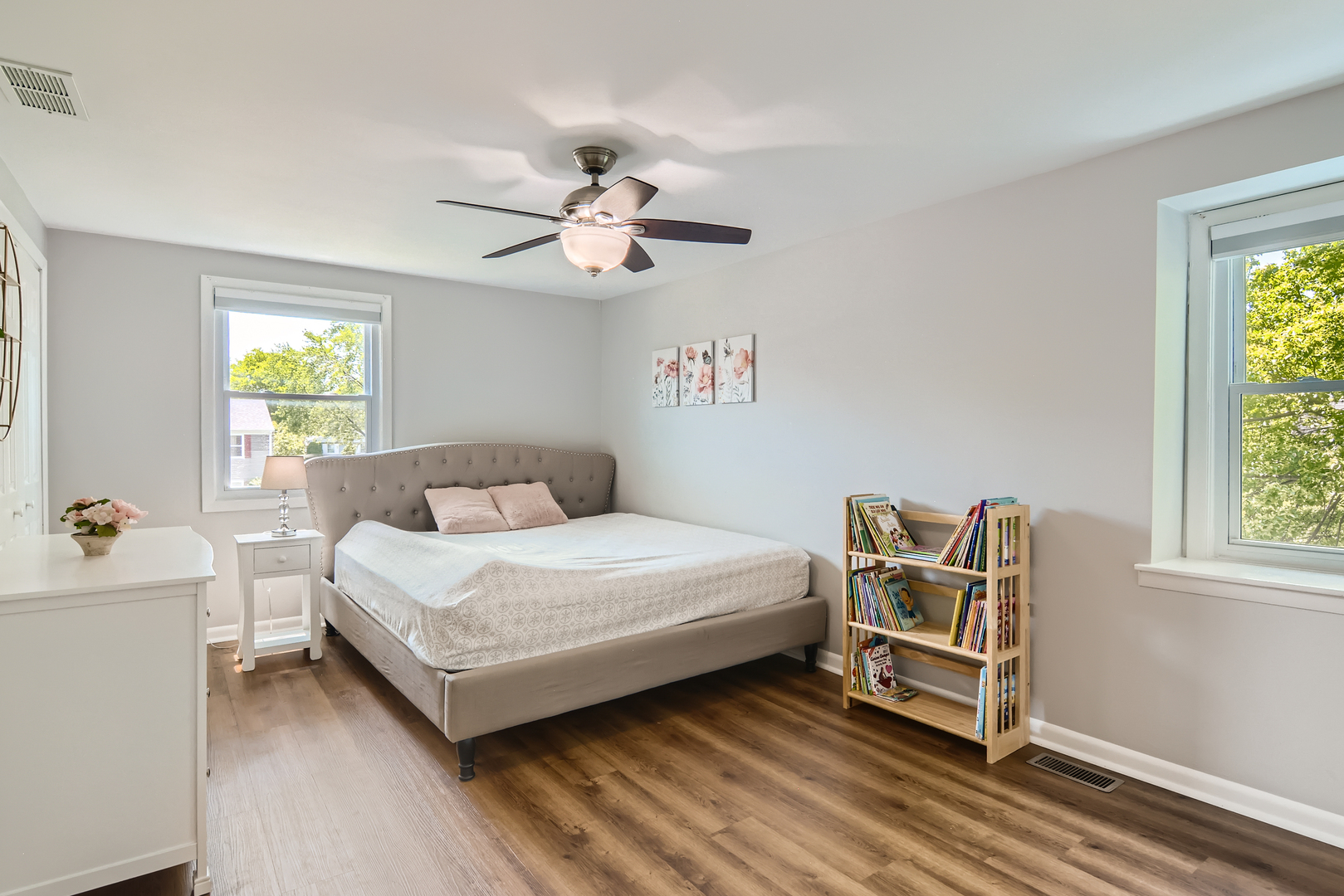 424 North Salem Drive Schaumburg, IL 60169 - Photo 14 of 26 a bedroom with a bed and a chandelier