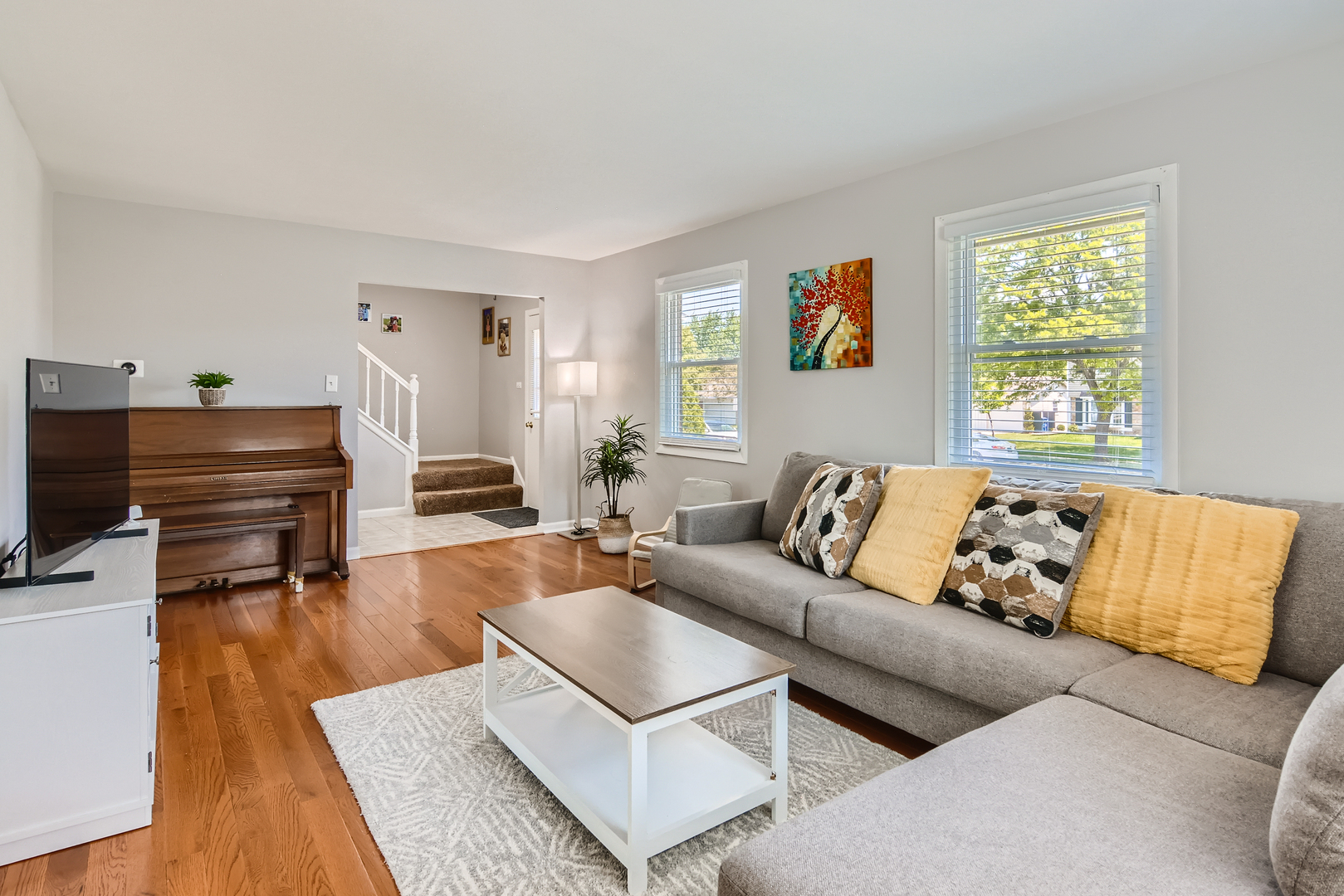 424 North Salem Drive Schaumburg, IL 60169 - Photo 2 of 26 a living room with furniture and a wooden floor