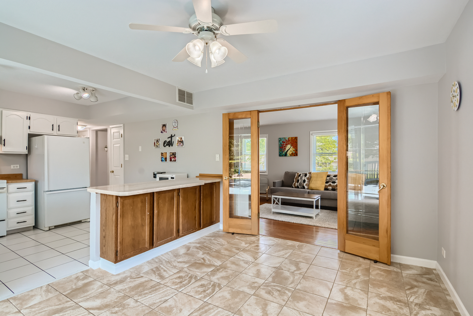 424 North Salem Drive Schaumburg, IL 60169 - Photo 9 of 26 a view of kitchen with furniture electronic appliances and window