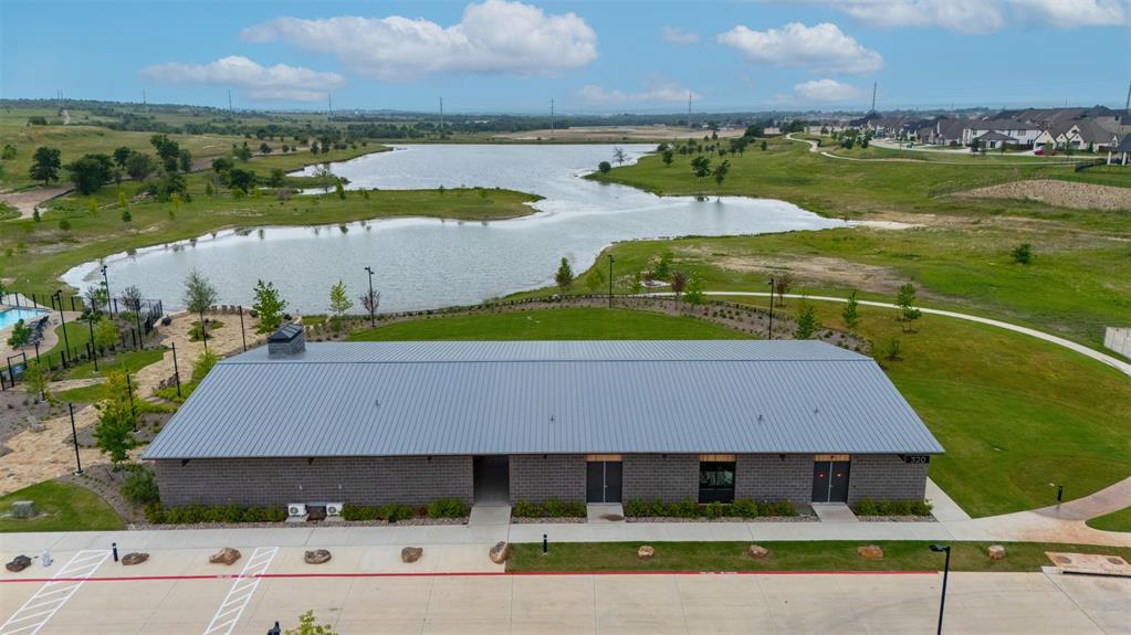 228 Palo Duro Bend Rhome, TX 76078 - Photo 33 of 35 an aerial view of a house with a yard and lake view