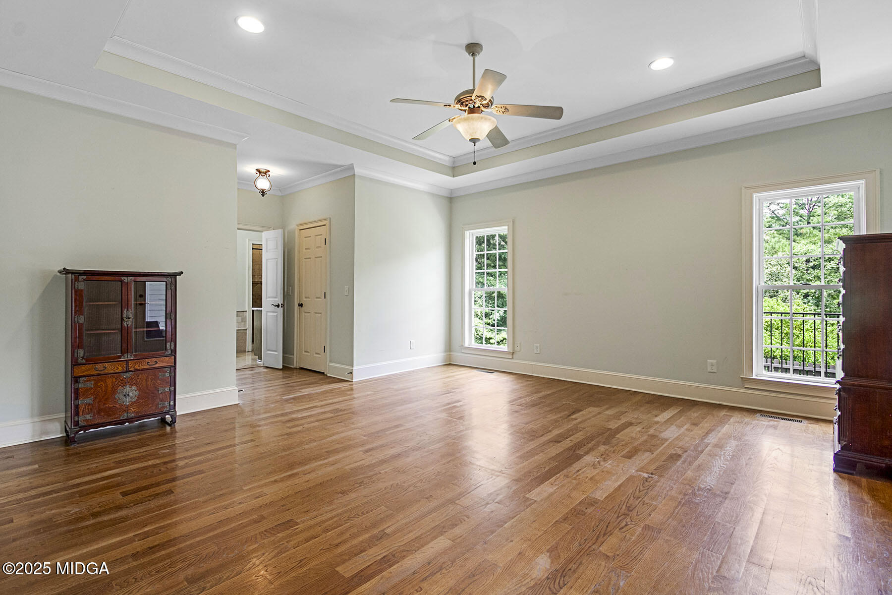532 King Road Forsyth, GA 31029 - Photo 16 of 47 a view of an empty room with wooden floor and a window