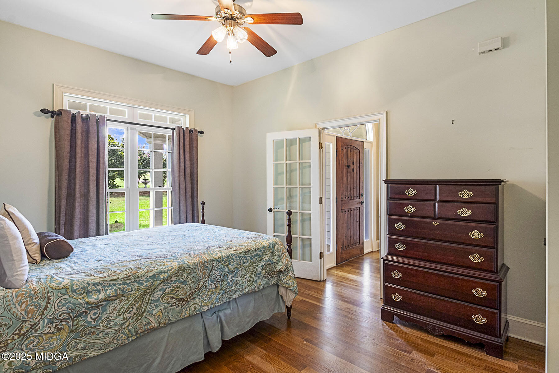 532 King Road Forsyth, GA 31029 - Photo 26 of 47 a bedroom with a bed dresser and a window