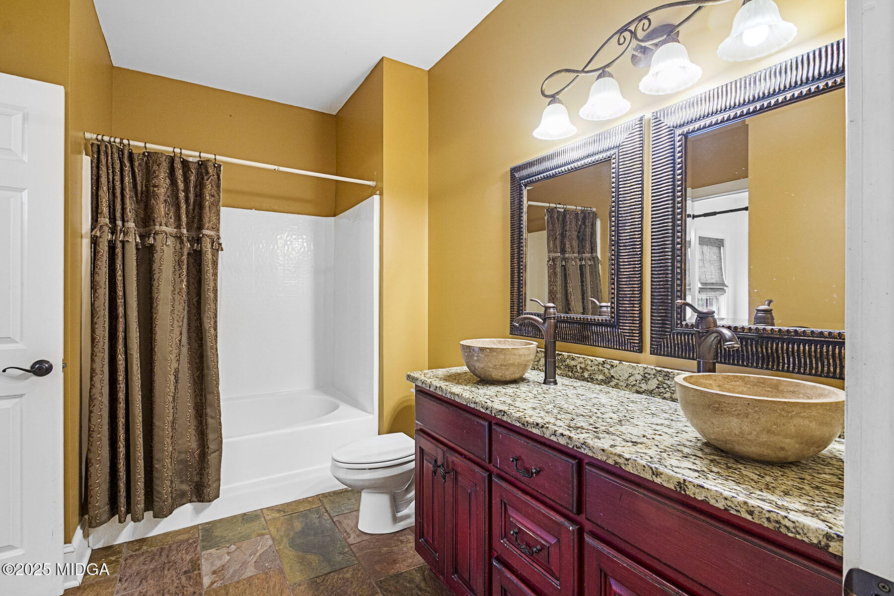 532 King Road Forsyth, GA 31029 - Photo 28 of 47 a bathroom with a granite countertop sink and a mirror
