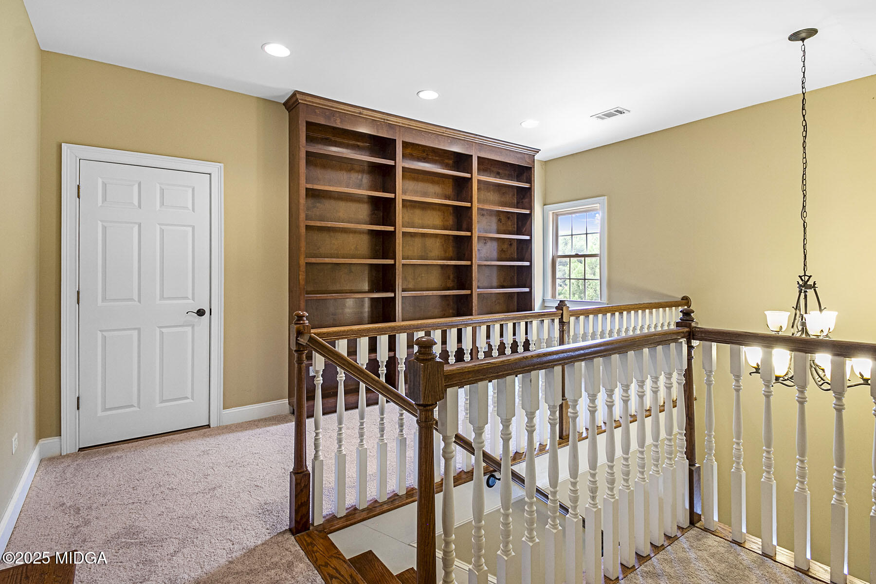 532 King Road Forsyth, GA 31029 - Photo 32 of 47 a view of staircase with white walls and a window