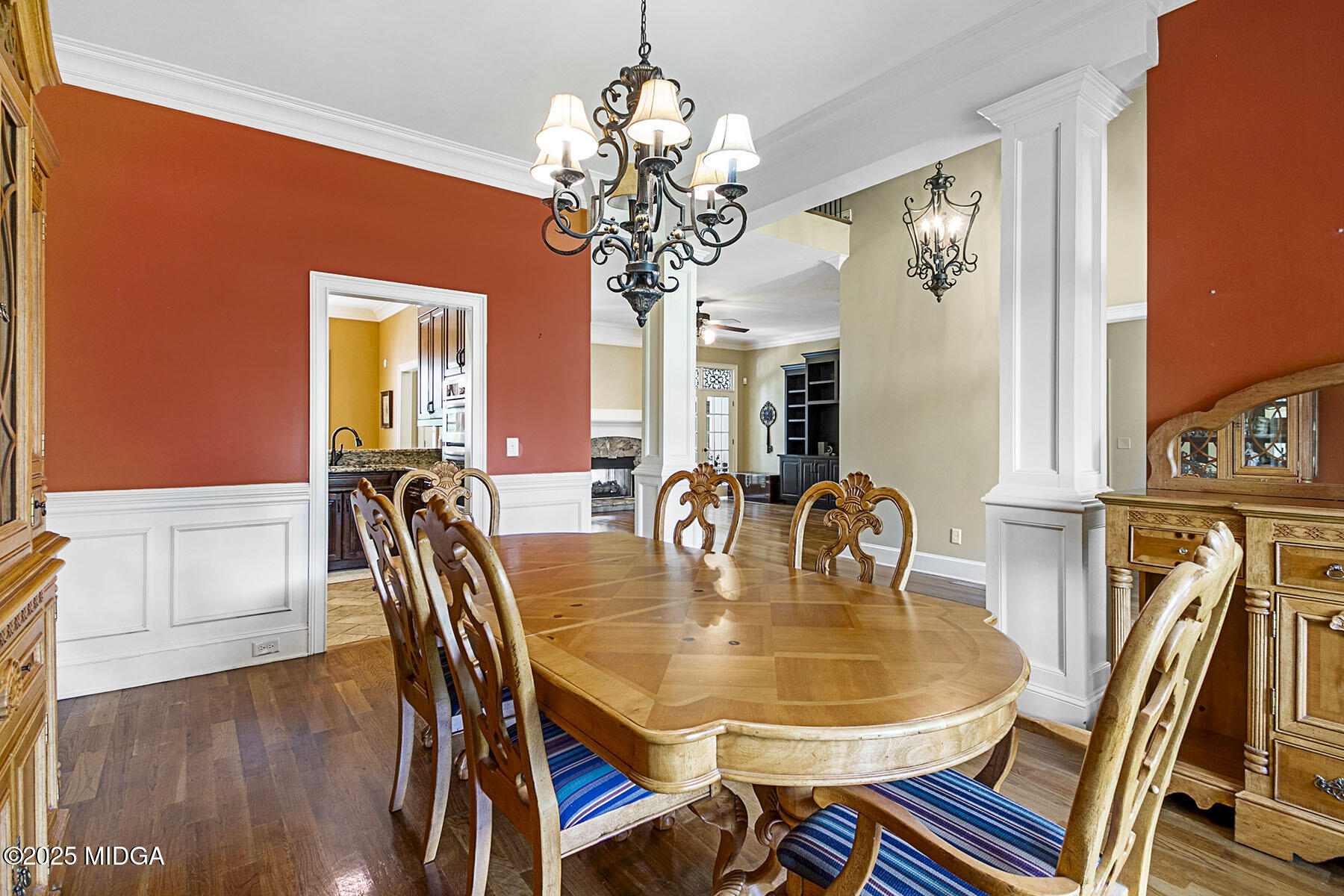 532 King Road Forsyth, GA 31029 - Photo 8 of 47 a dining room with furniture a chandelier and wooden floor