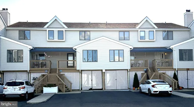 a car parked in front of a house