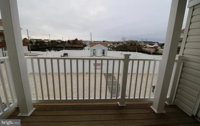 a view of balcony with furniture