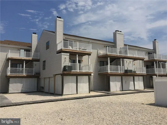 a view of kitchen with kitchen island a counter top space and appliances