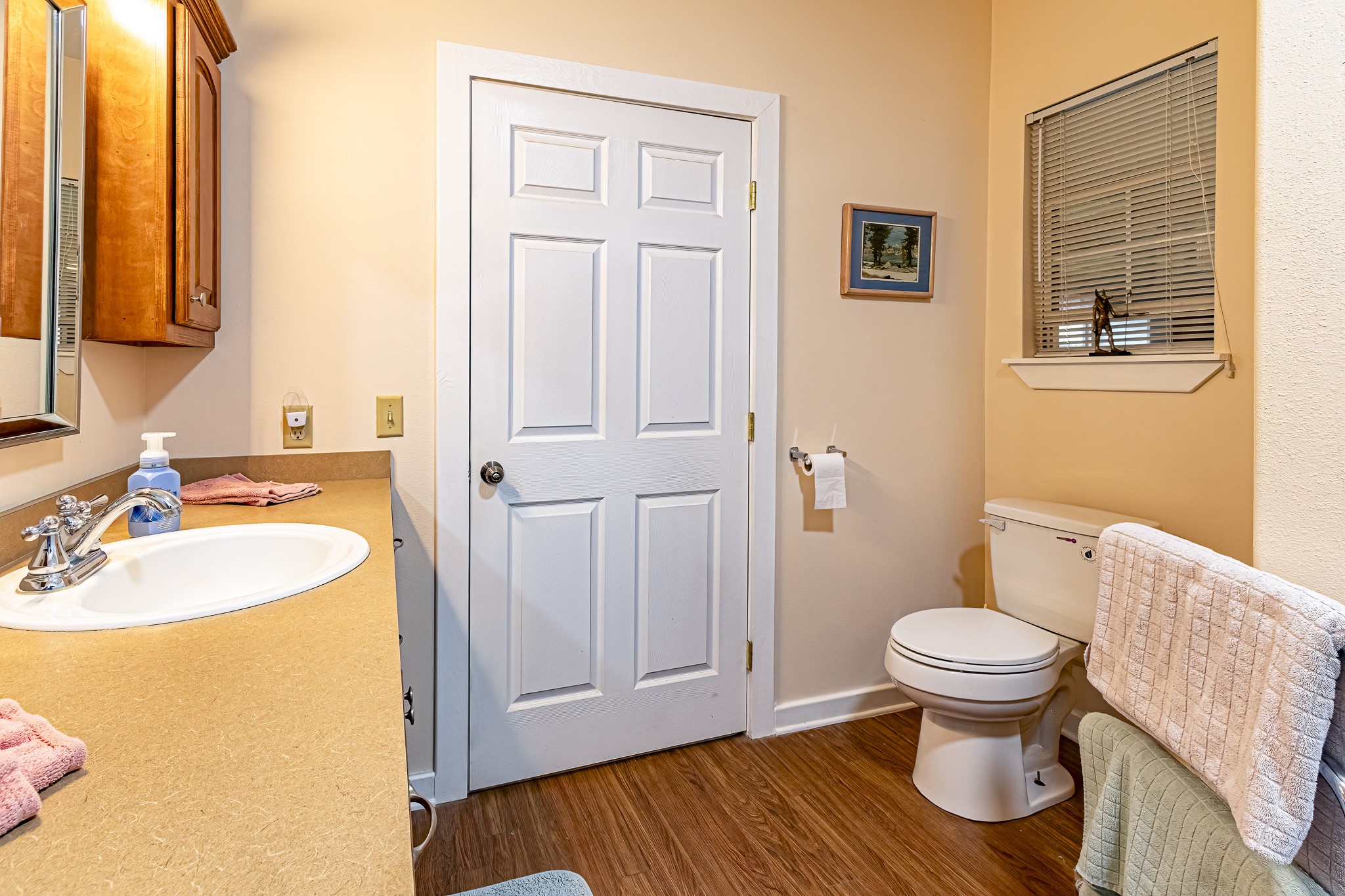 188 Pullin Road Corrigan, TX 75939 - Photo 18 of 50 a bathroom with a sink and a toilet