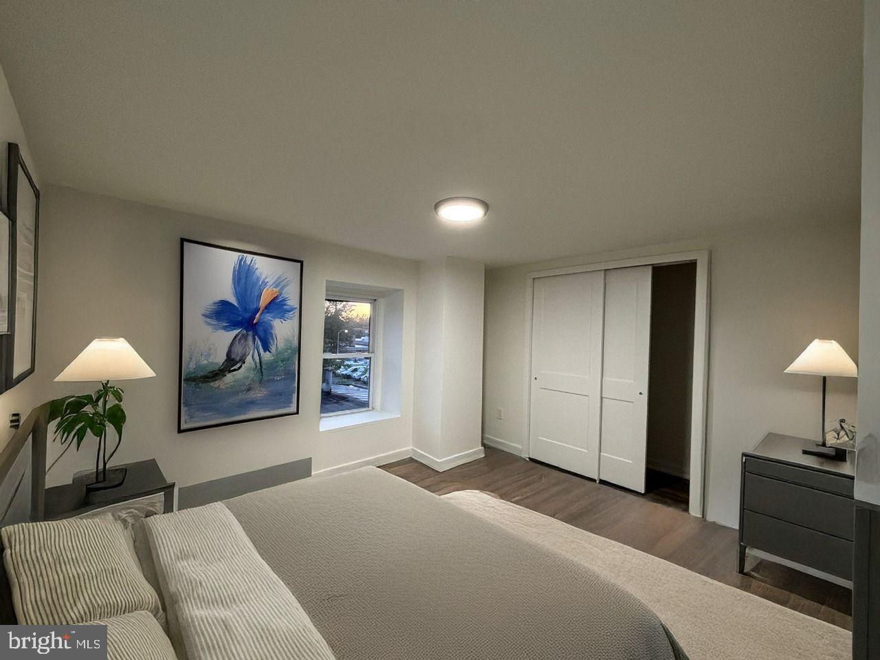 438 Lawrence Street Burlington, NJ 08016 - Photo 13 of 21 Serene bedroom with vibrant artwork.