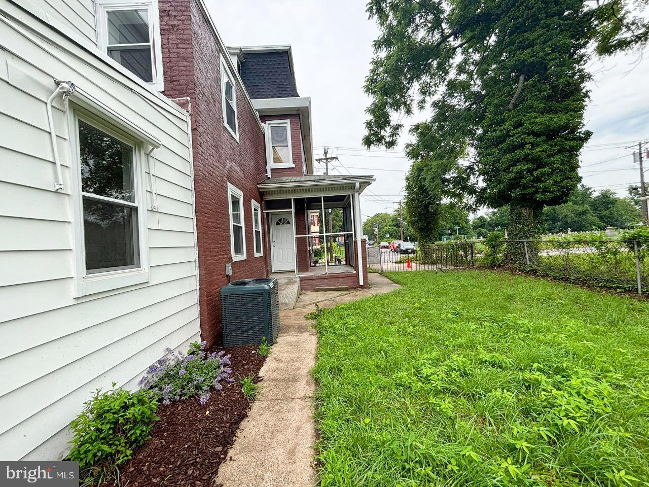 438 Lawrence Street Burlington, NJ 08016 - Photo 17 of 21 Charming exterior with lush greenery.
