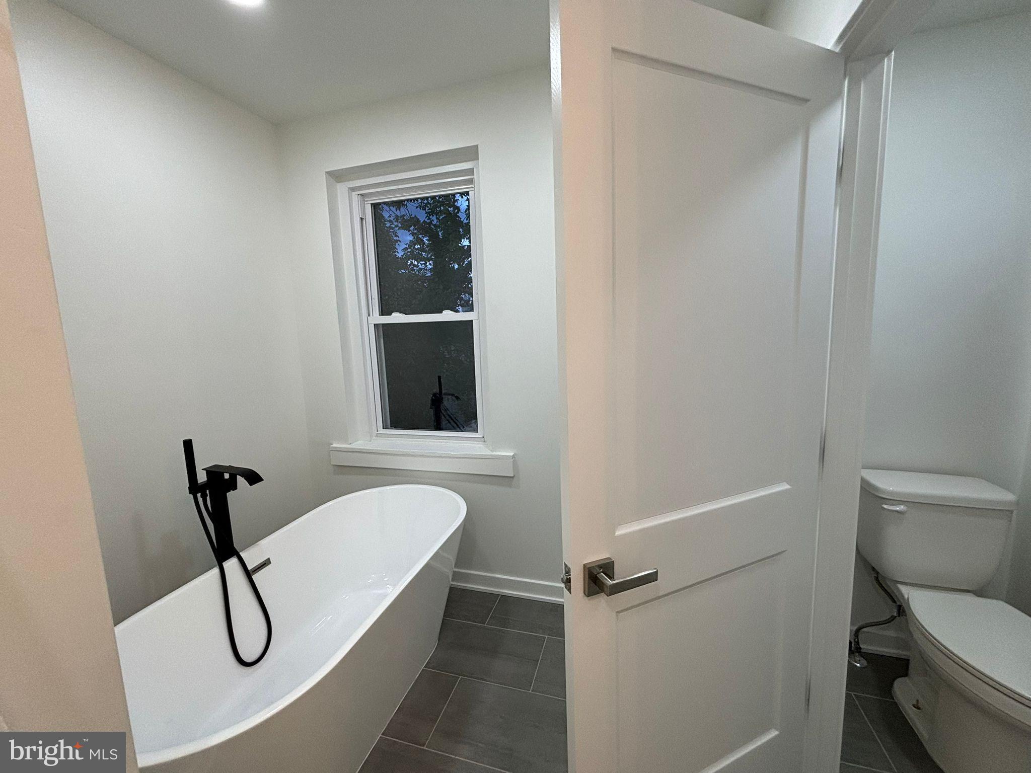 438 Lawrence Street Burlington, NJ 08016 - Photo 9 of 21 Modern bathroom with elegant soaking tub.