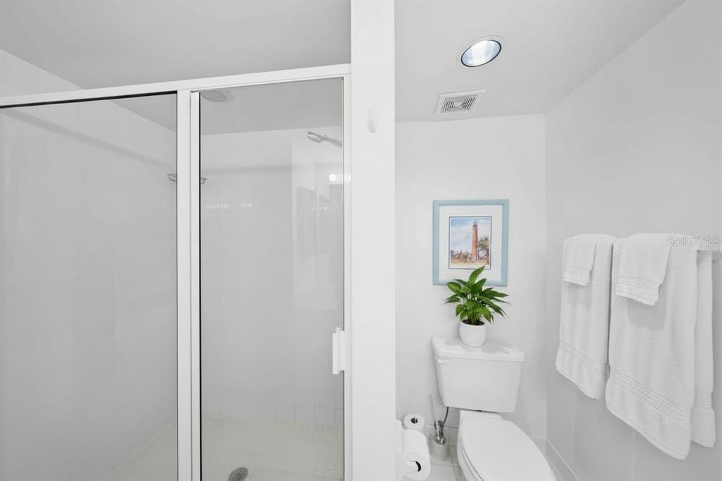 4575 South Atlantic Avenue, Unit 6209 Ponce Inlet, FL 32127 - Photo 19 of 31 a bathroom with a shower a toilet and a shower
