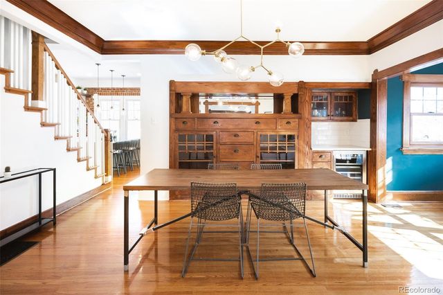 a view of a swimming pool with seating space