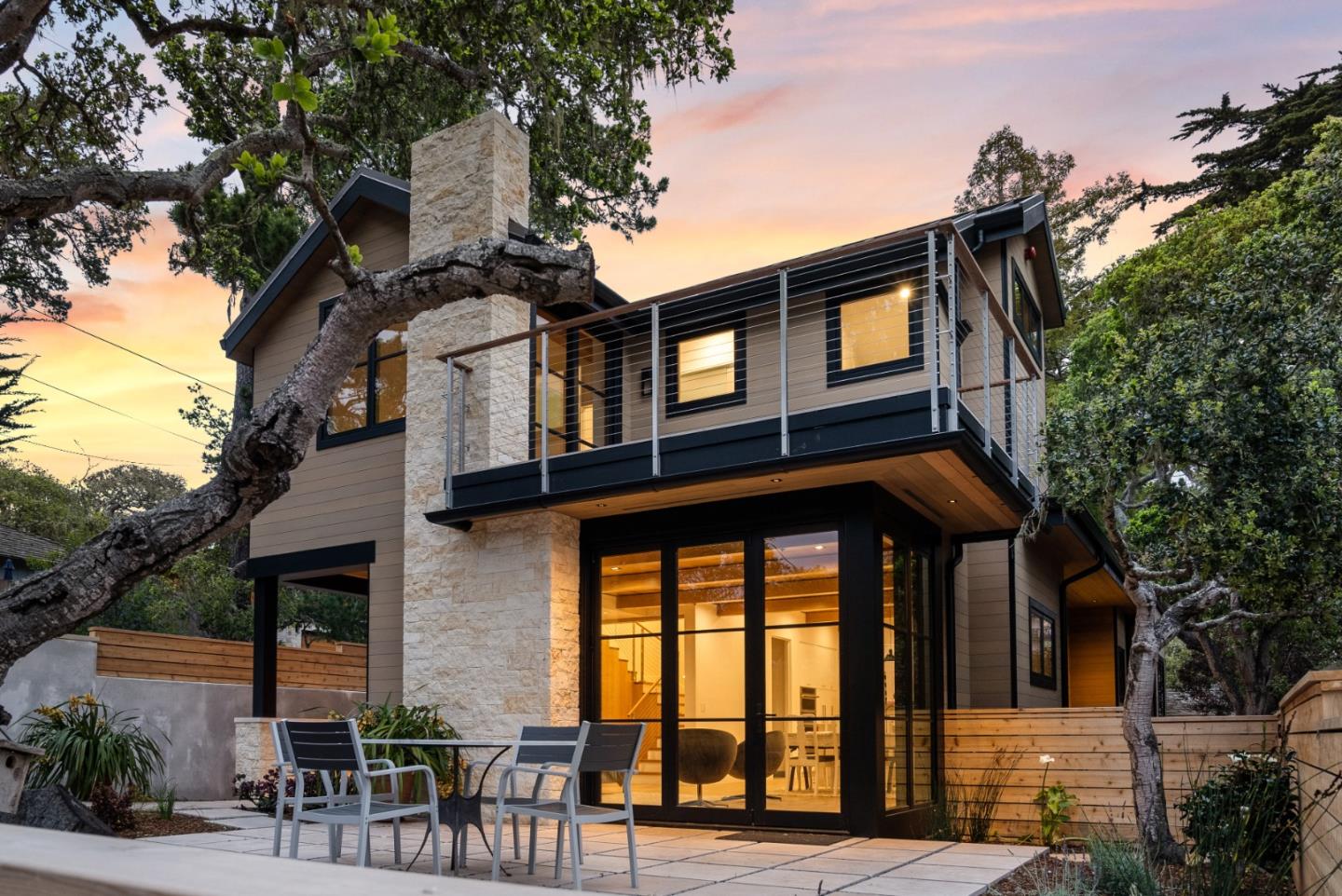 0 Southeast Se Corner Carmel, CA 93921 - Photo 1 of 39 a front view of a house with glass windows and plants
