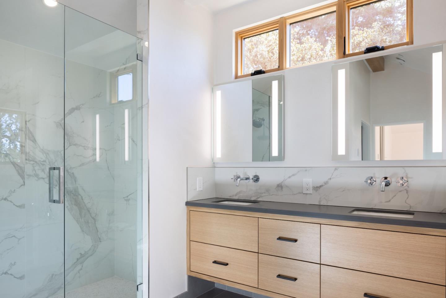 0 Southeast Se Corner Carmel, CA 93921 - Photo 17 of 39 a bathroom with a granite countertop sink mirror and cabinets