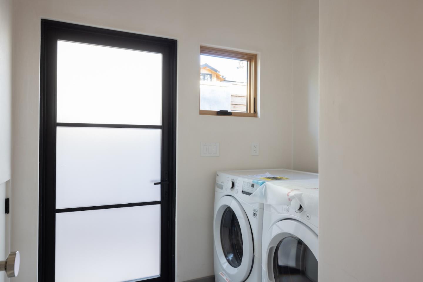 0 Southeast Se Corner Carmel, CA 93921 - Photo 23 of 39 a utility room with dryer and washer