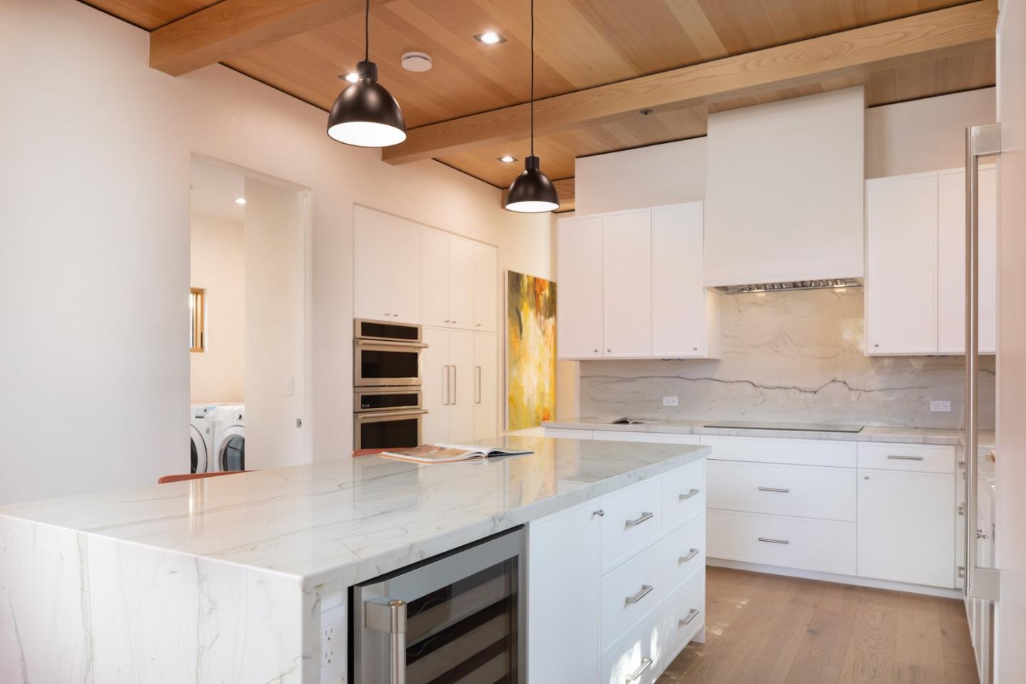 0 Southeast Se Corner Carmel, CA 93921 - Photo 24 of 39 a kitchen with a sink stainless steel appliances and white cabinets