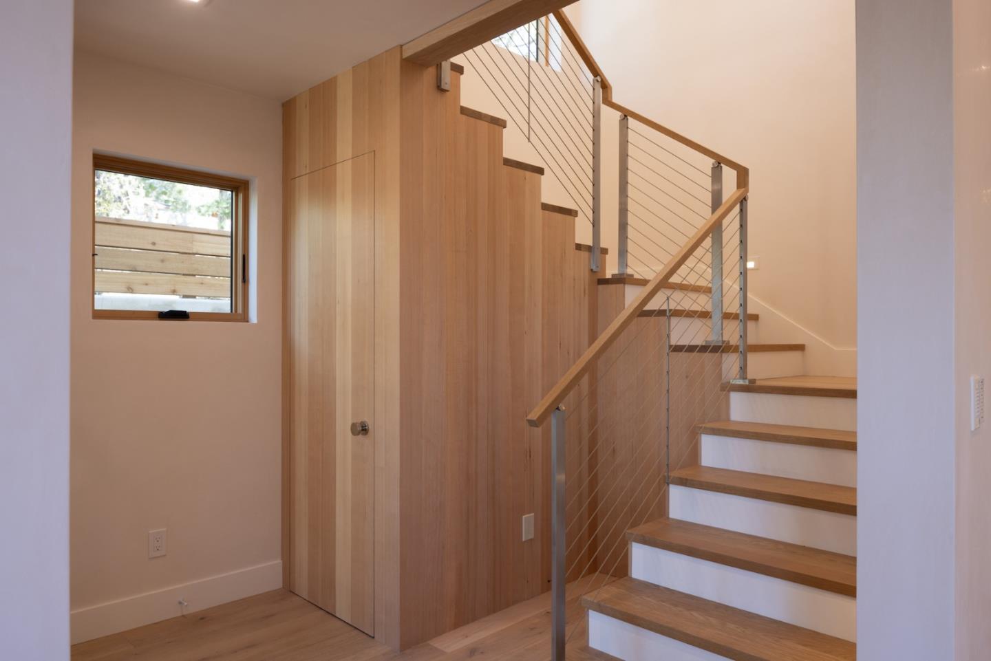 0 Southeast Se Corner Carmel, CA 93921 - Photo 31 of 39 a view of entryway with wooden floor and stairs