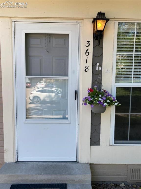 3618 Queen Anne Way Colorado Springs, CO 80917 - Photo 3 of 3 a view of front door