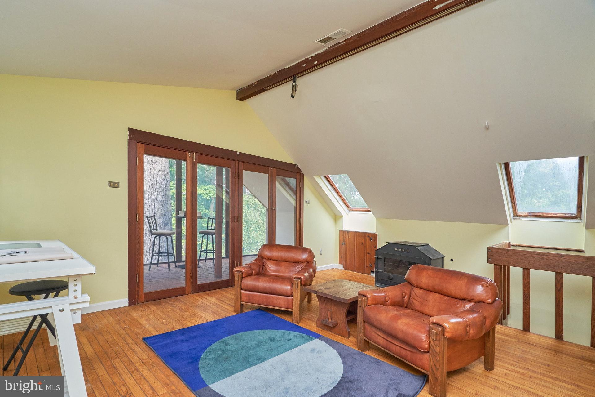 3301 Chatham Road Hyattsville, MD 20783 - Photo 14 of 33 Large loft with French doors to sunroom