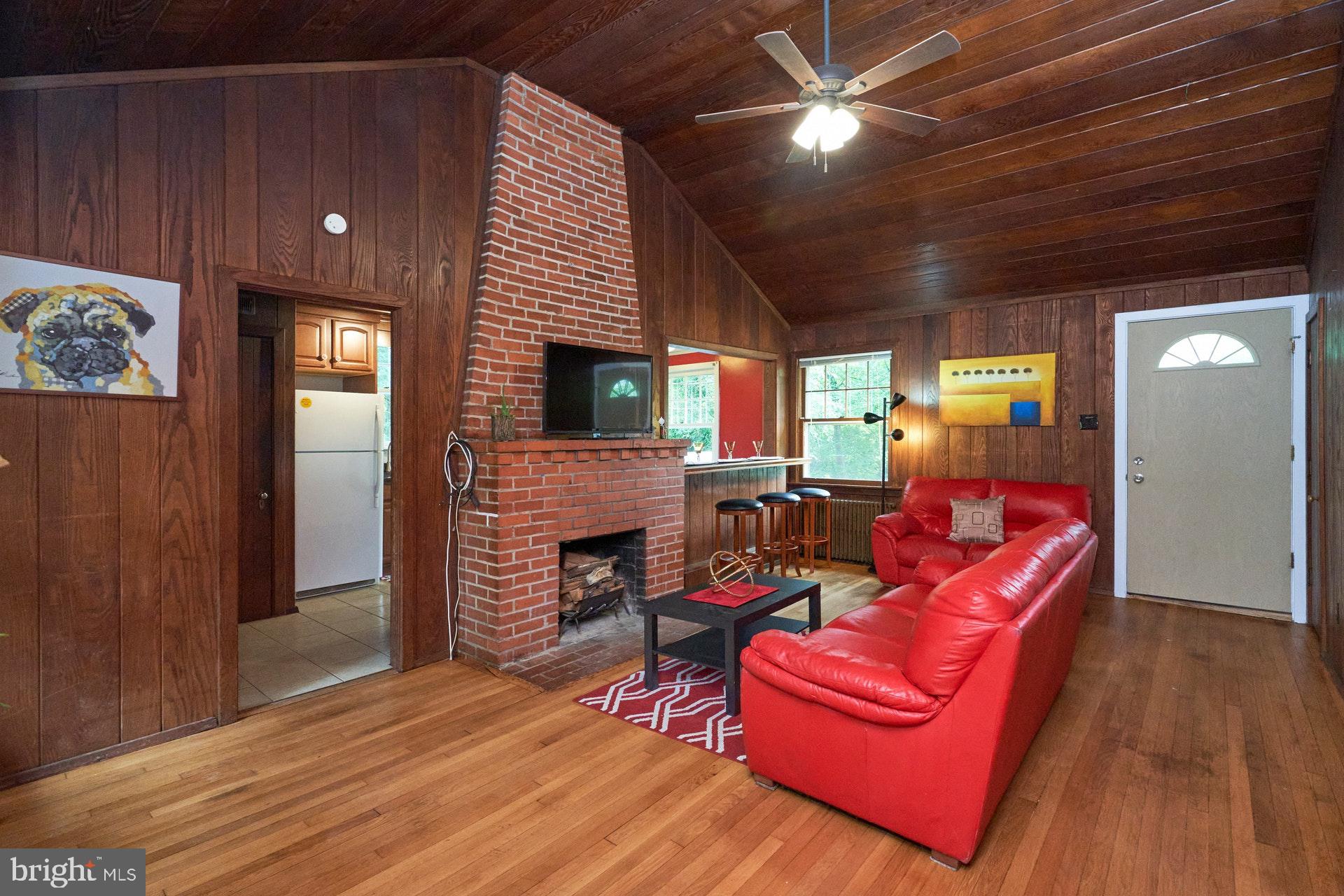 3301 Chatham Road Hyattsville, MD 20783 - Photo 3 of 33 Living room has a grand fireplace and high ceiling