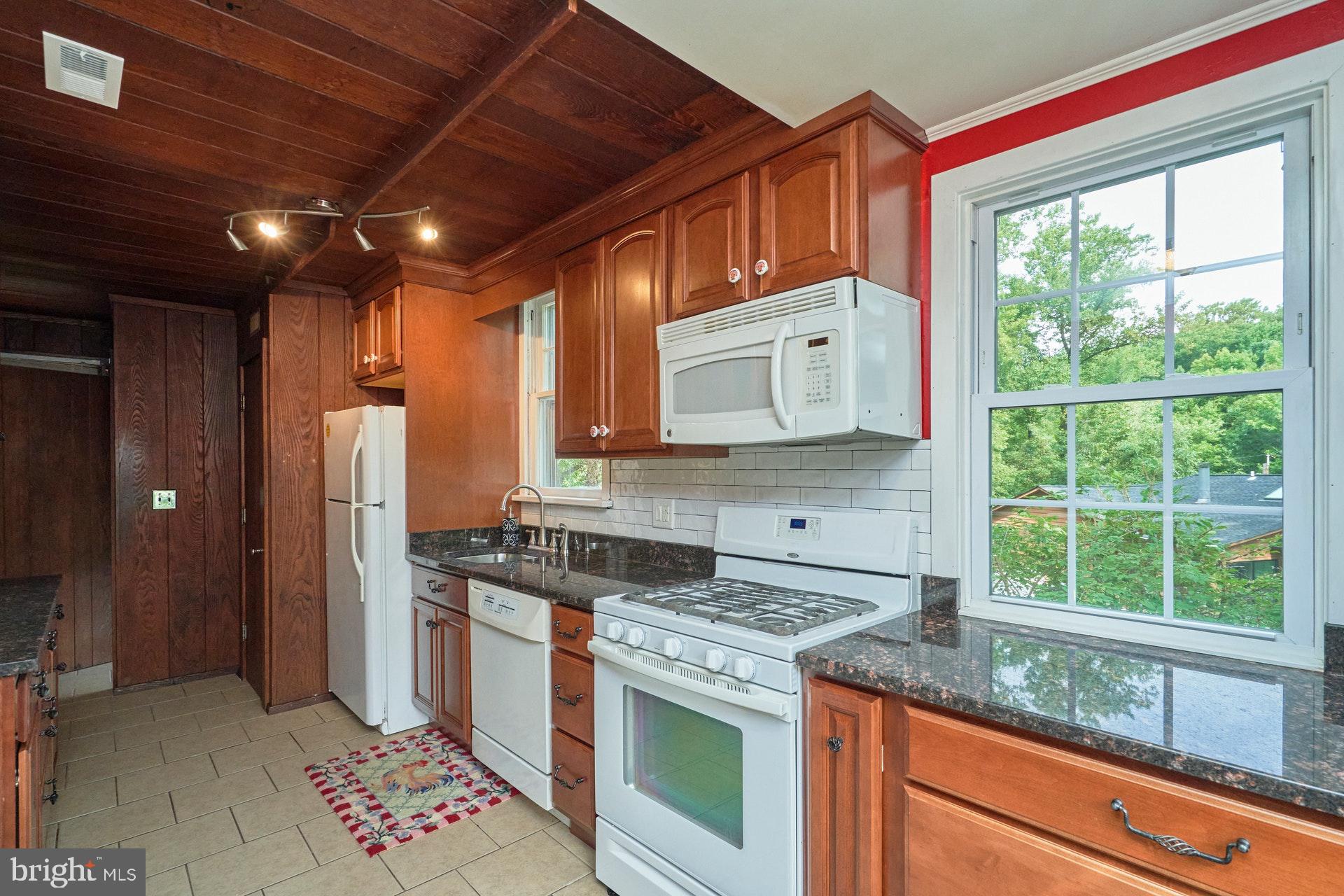 3301 Chatham Road Hyattsville, MD 20783 - Photo 5 of 33 Kitchen w/ceramic tile floors and white appliances