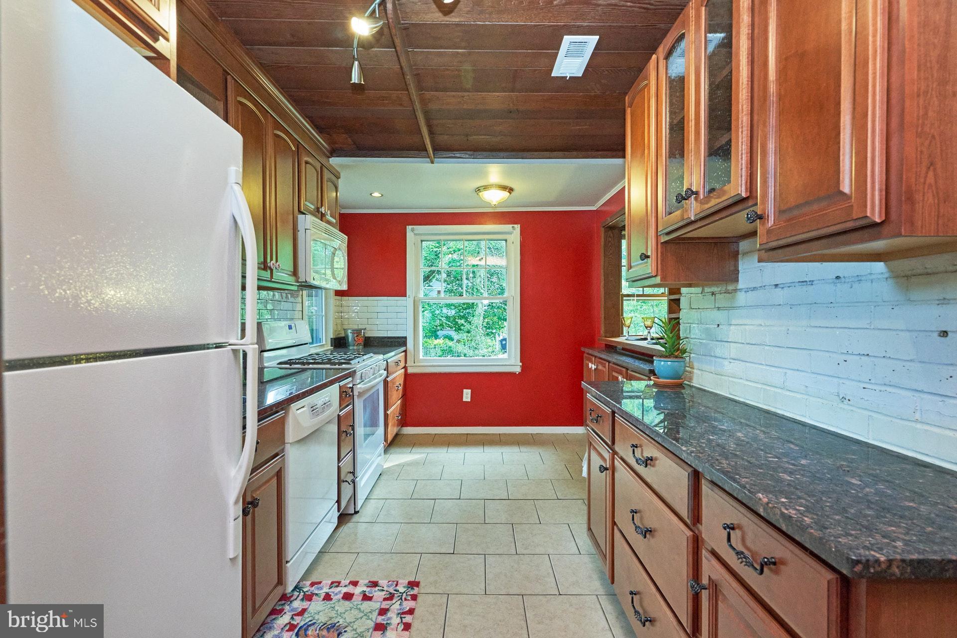 3301 Chatham Road Hyattsville, MD 20783 - Photo 7 of 33 Kitchen w/granite countertops, and Shaker cabinets