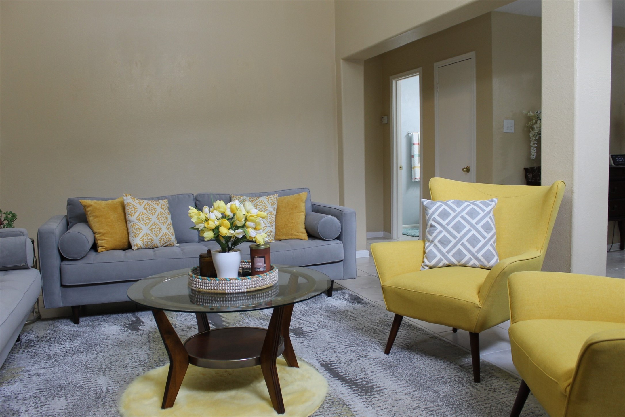 15818 Camp Fire Road Friendswood, TX 77546 - Photo 11 of 36 a living room with furniture and a potted plant