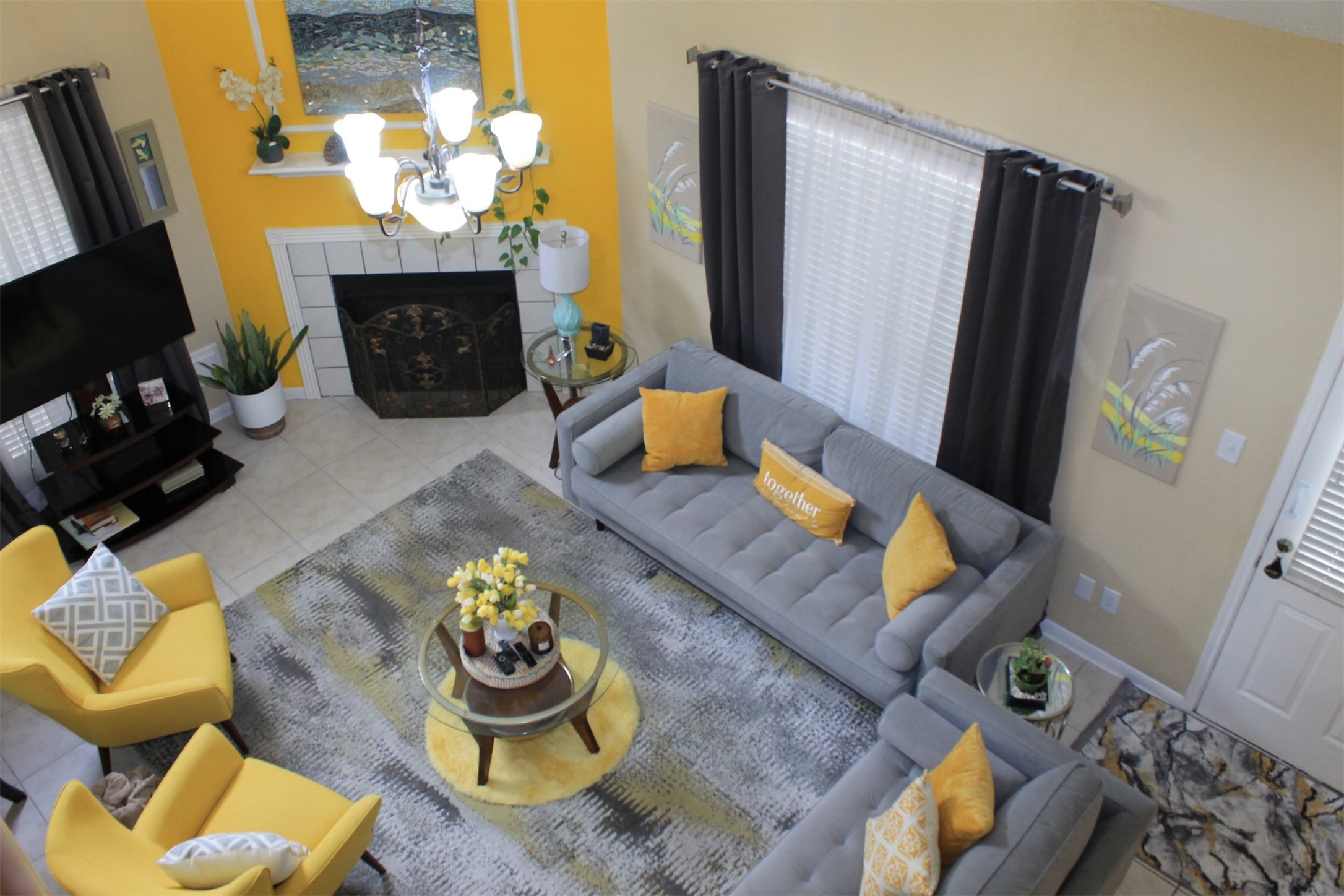 15818 Camp Fire Road Friendswood, TX 77546 - Photo 12 of 36 a living room with furniture and a fireplace