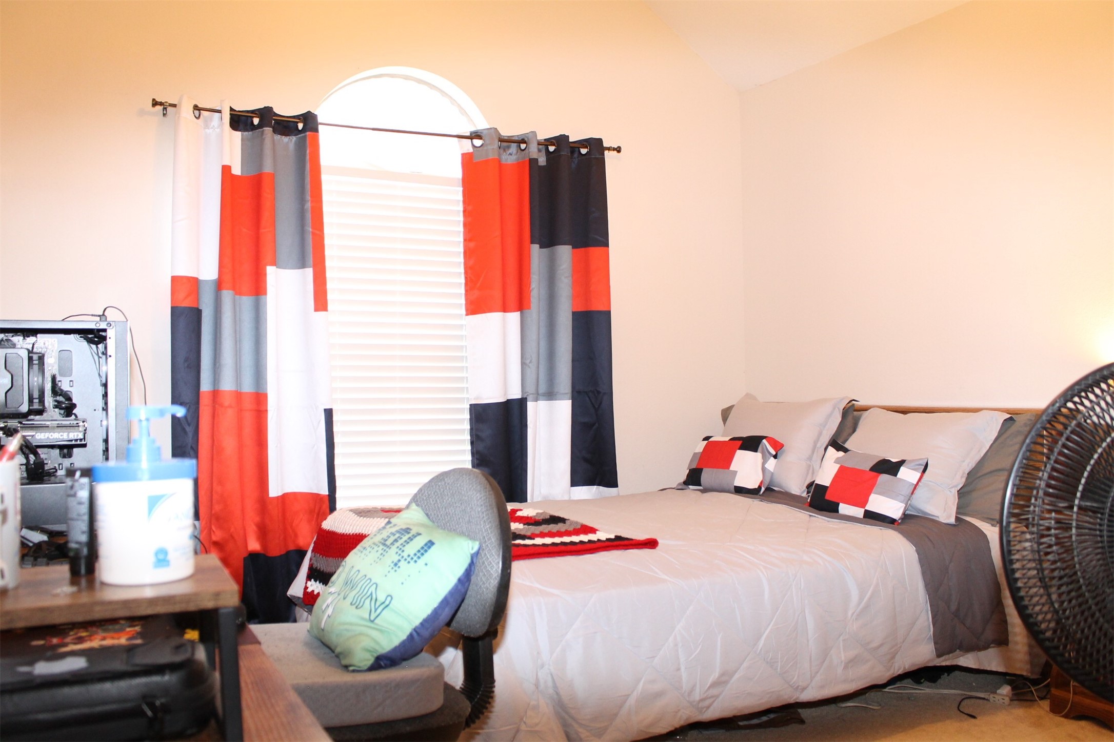 15818 Camp Fire Road Friendswood, TX 77546 - Photo 26 of 36 a bedroom with a bed and a chair