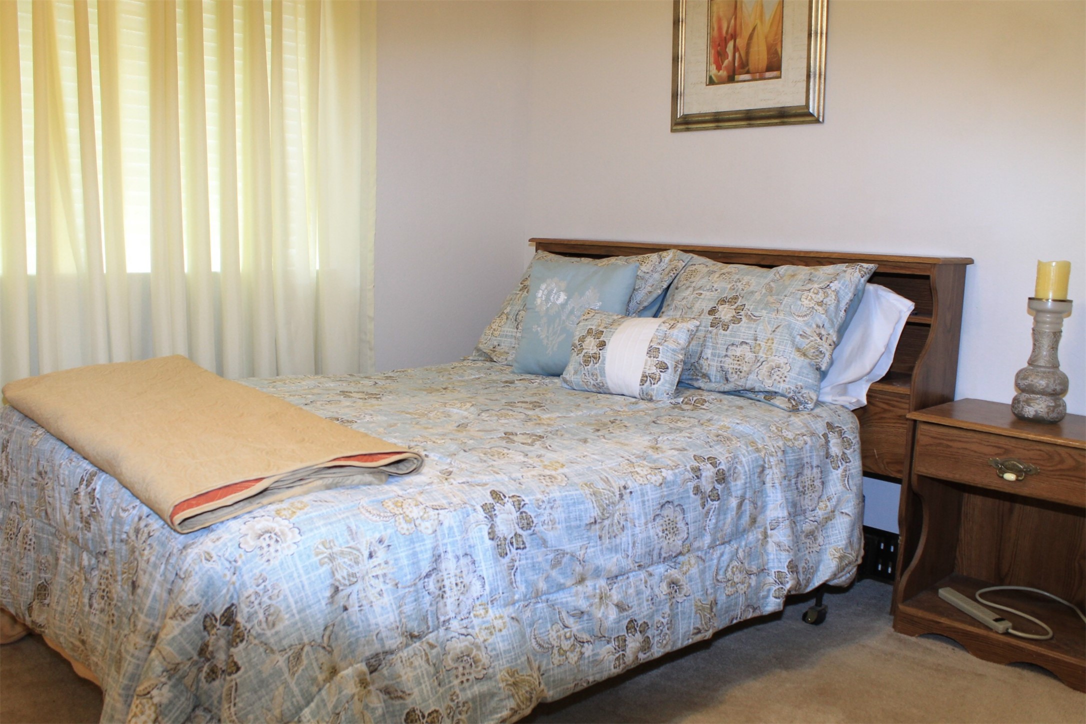 15818 Camp Fire Road Friendswood, TX 77546 - Photo 30 of 36 a bedroom with a bed and wooden floor