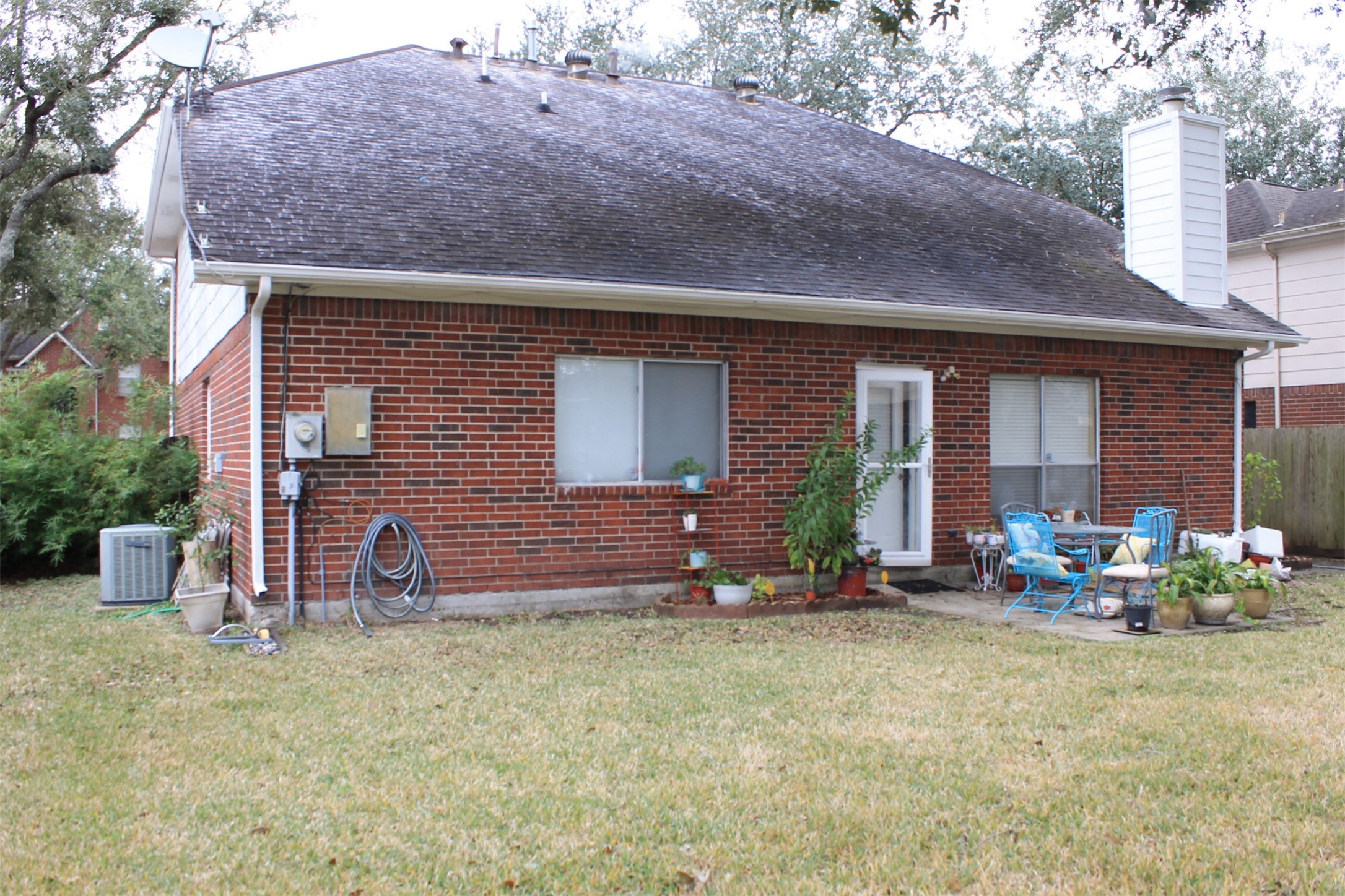 15818 Camp Fire Road Friendswood, TX 77546 - Photo 35 of 36 a front view of house with an outdoor seating