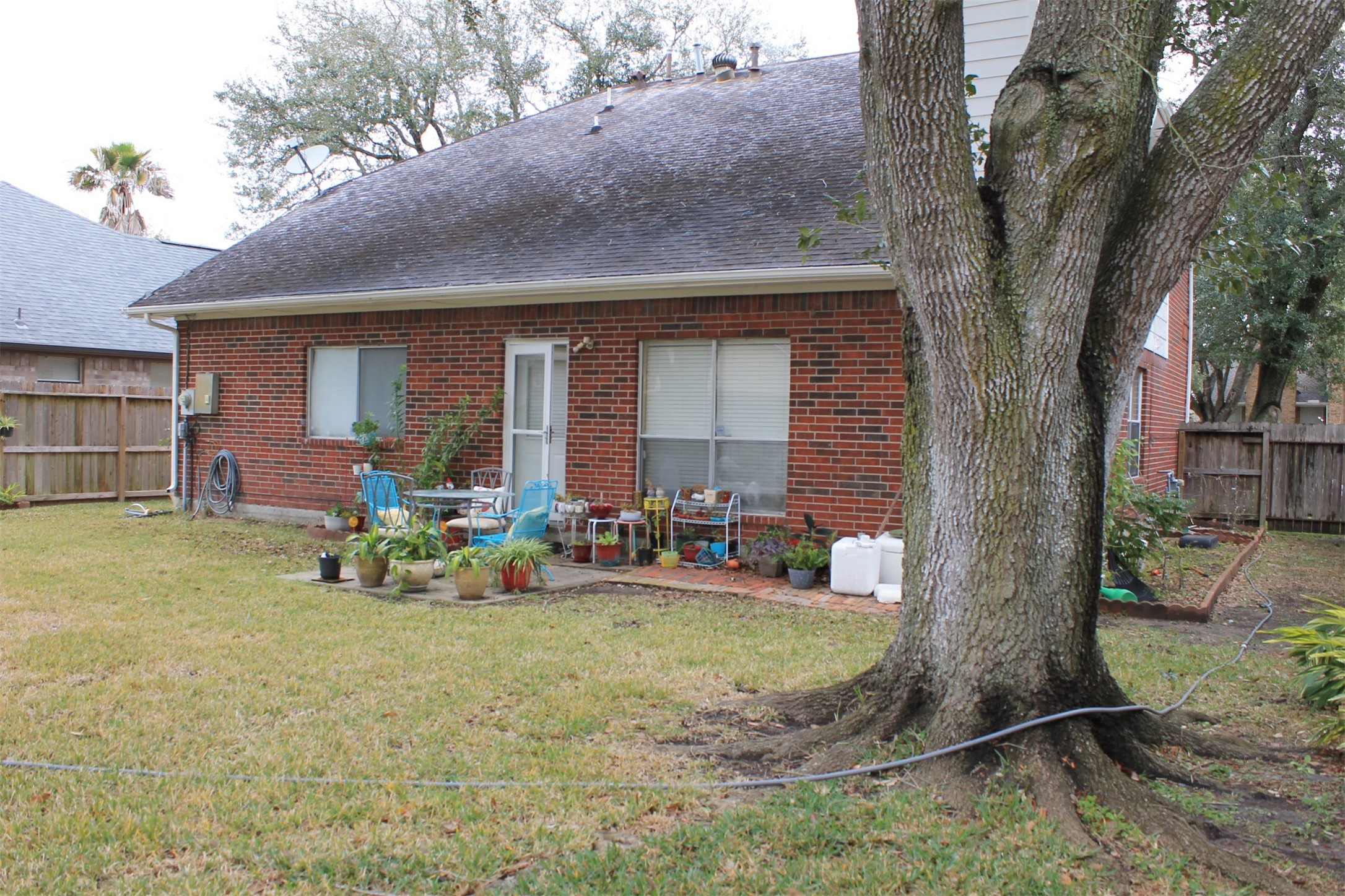 15818 Camp Fire Road Friendswood, TX 77546 - Photo 36 of 36 a view of a house with backyard and sitting area