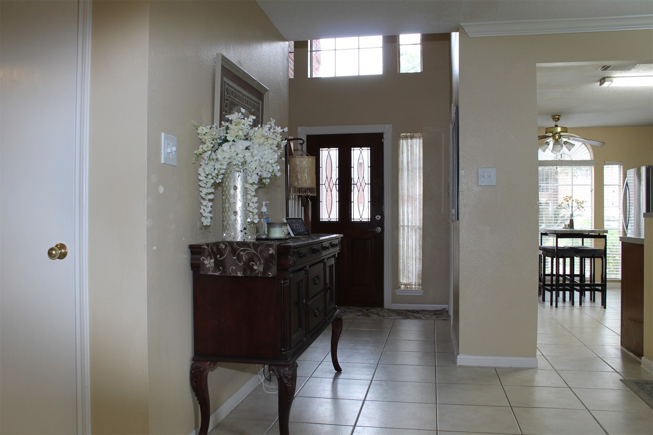 15818 Camp Fire Road Friendswood, TX 77546 - Photo 4 of 36 a view of a dining room with furniture and chandelier