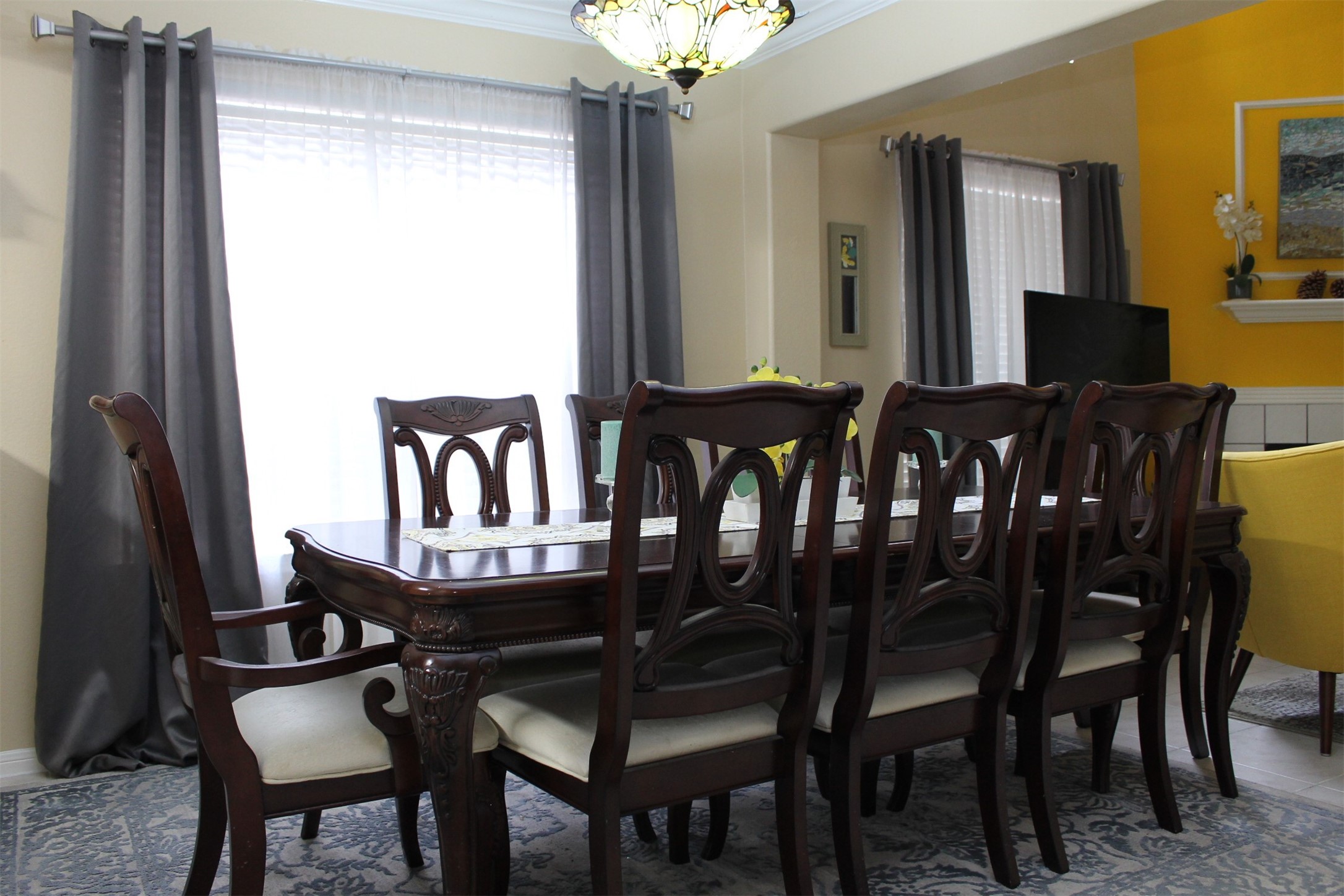 15818 Camp Fire Road Friendswood, TX 77546 - Photo 5 of 36 a view of a dining room with furniture and chandelier