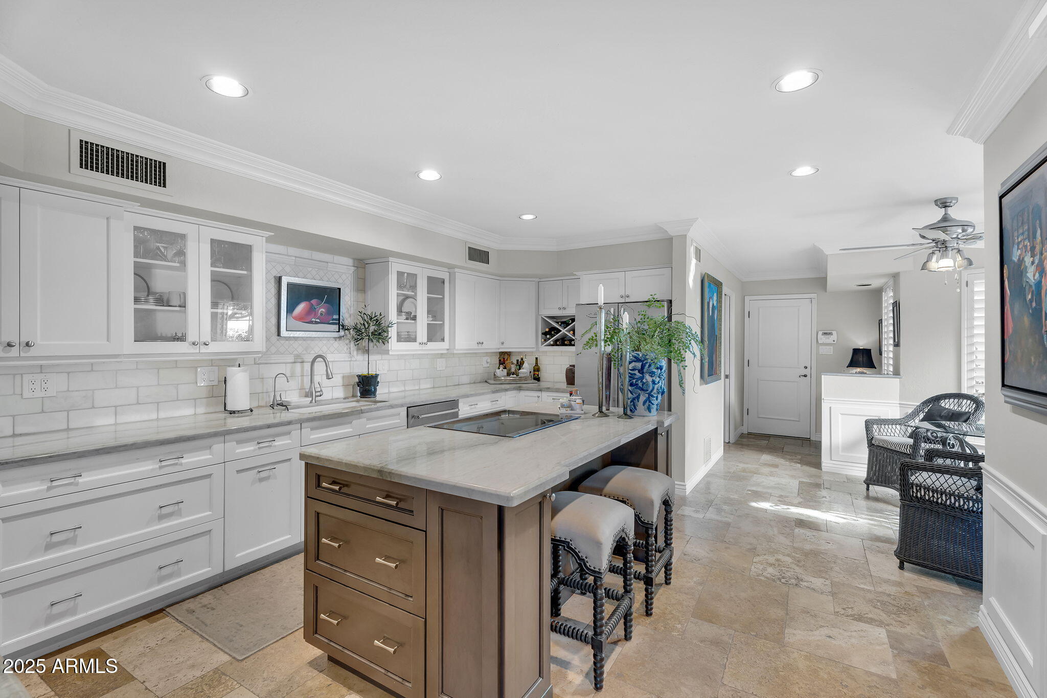 6701 North Scottsdale Road, Unit 16 Scottsdale, AZ 85250 - Photo 14 of 83 a kitchen with a sink stove and cabinets