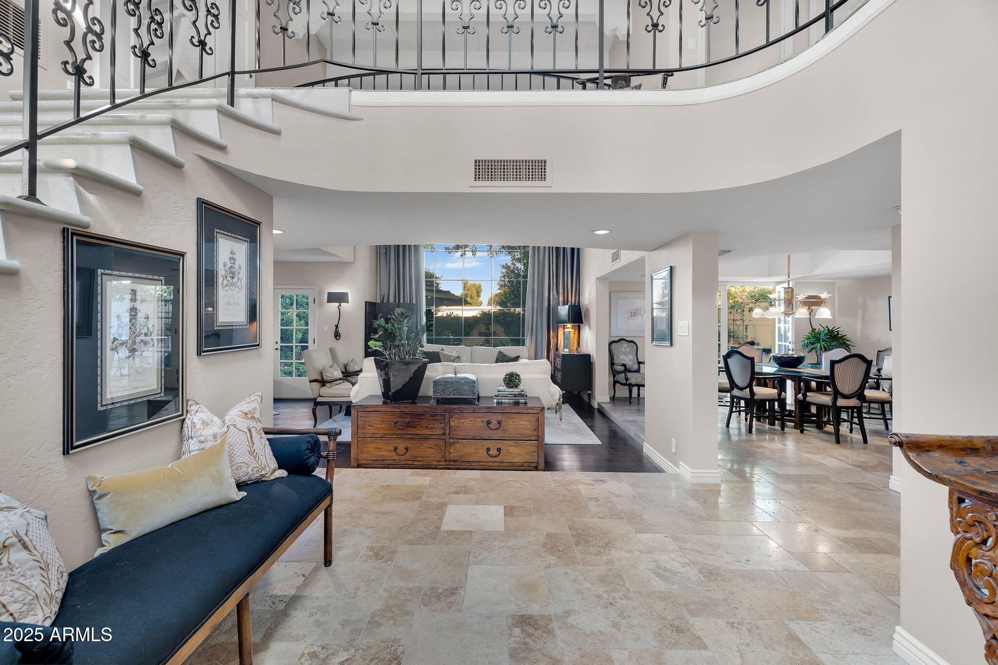 6701 North Scottsdale Road, Unit 16 Scottsdale, AZ 85250 - Photo 2 of 83 a living room with furniture and a dining table with kitchen view