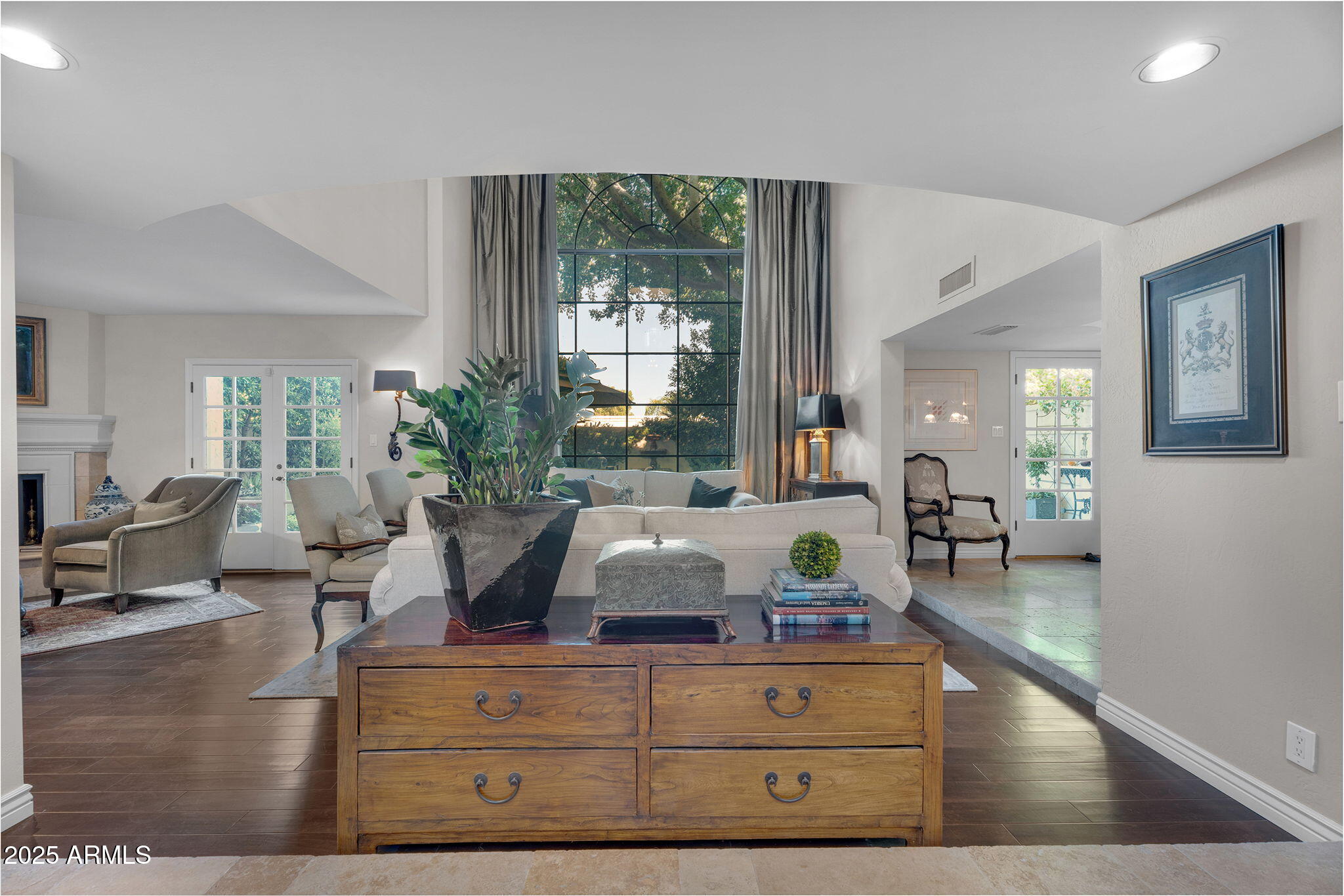 6701 North Scottsdale Road, Unit 16 Scottsdale, AZ 85250 - Photo 3 of 83 a living room with fireplace furniture and a large window