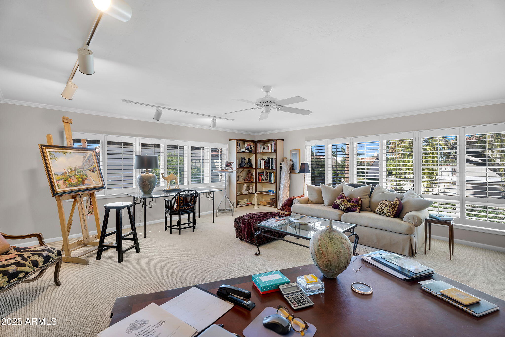6701 North Scottsdale Road, Unit 16 Scottsdale, AZ 85250 - Photo 35 of 83 a living room with furniture and wooden floor