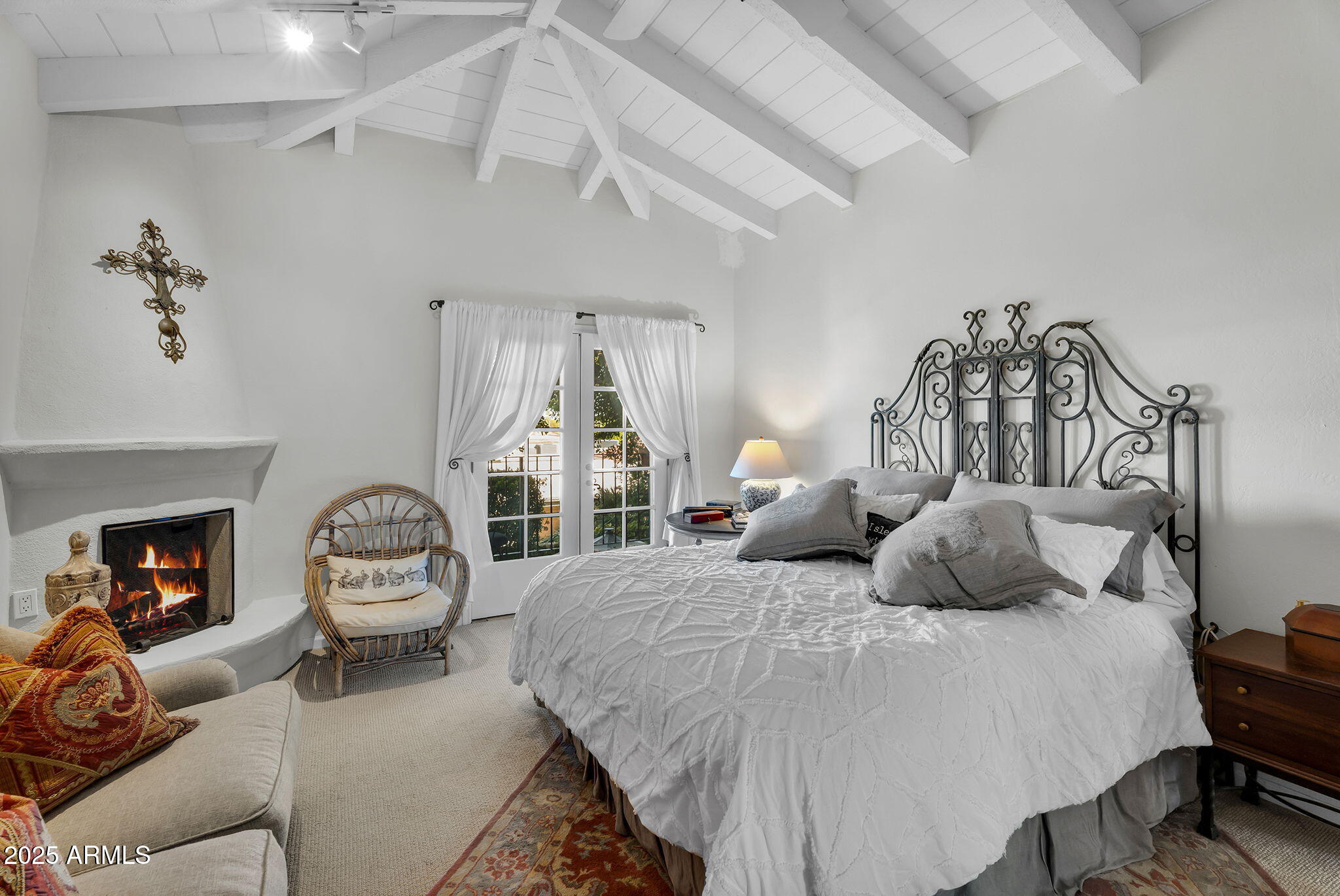 6701 North Scottsdale Road, Unit 16 Scottsdale, AZ 85250 - Photo 43 of 83 a bedroom with a bed and a chandelier