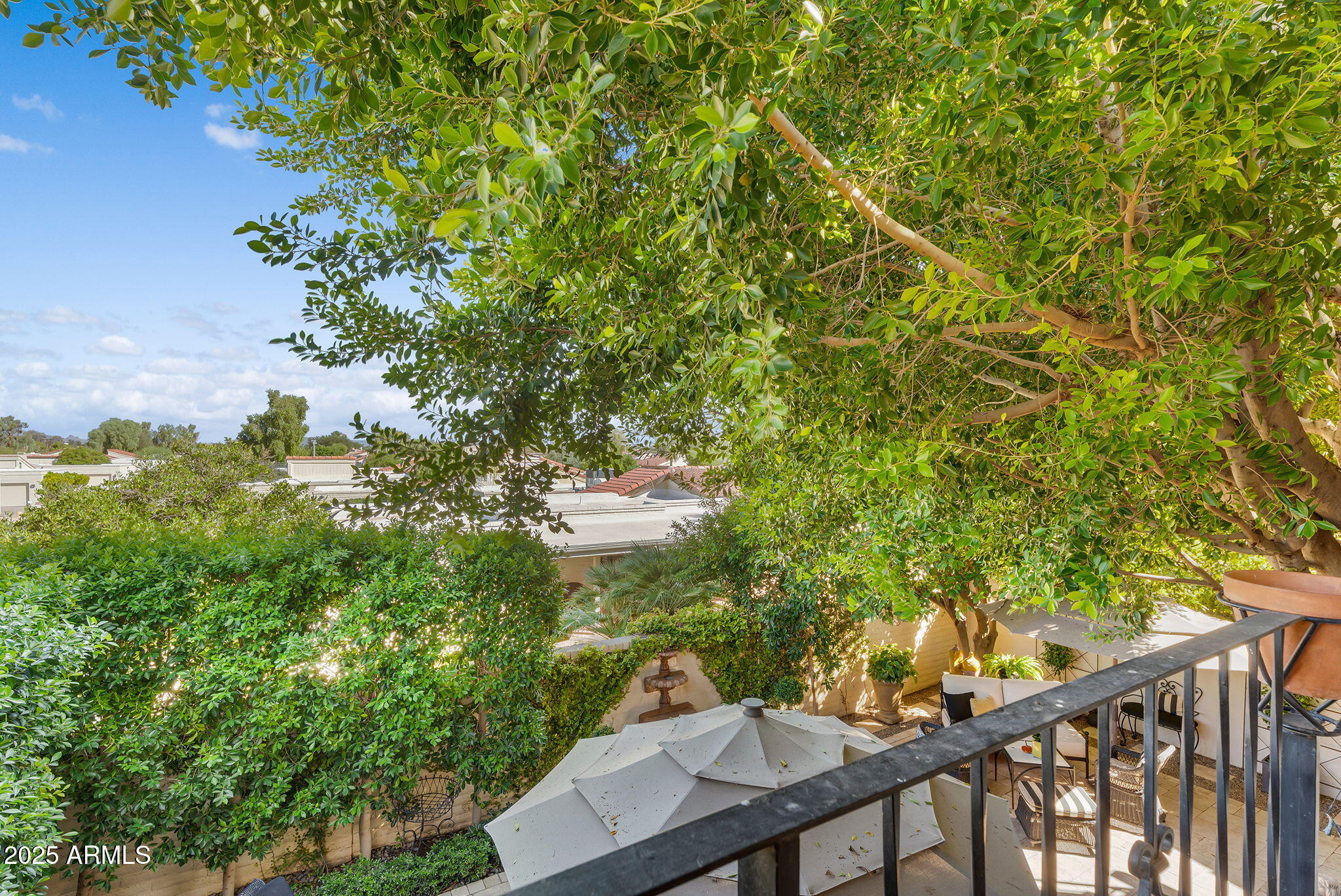 6701 North Scottsdale Road, Unit 16 Scottsdale, AZ 85250 - Photo 45 of 83 a view of a yard from a balcony