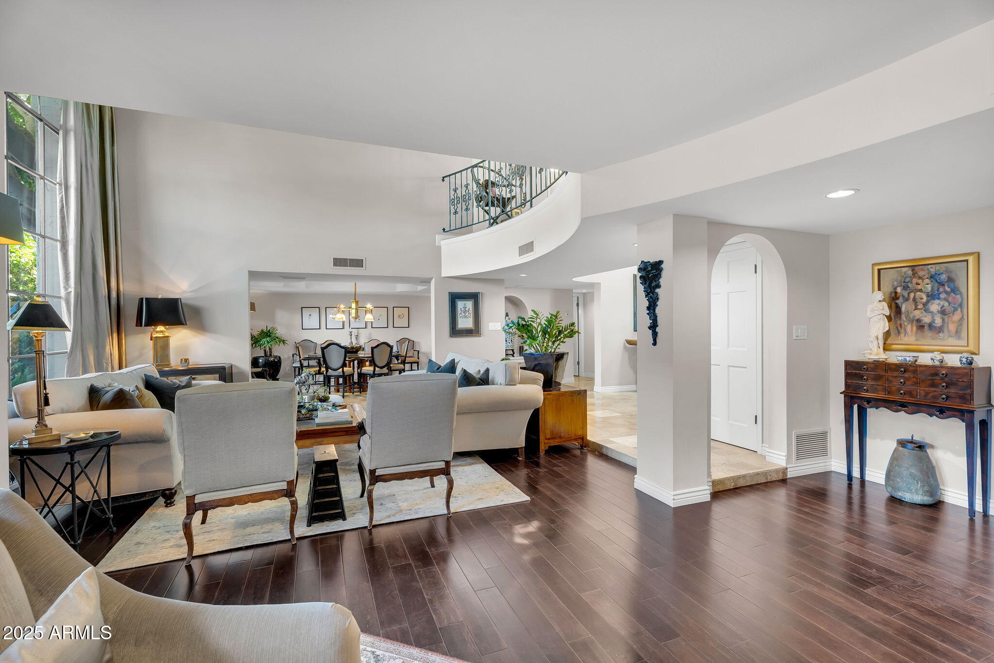 6701 North Scottsdale Road, Unit 16 Scottsdale, AZ 85250 - Photo 10 of 83 a living room with furniture and a wooden floor