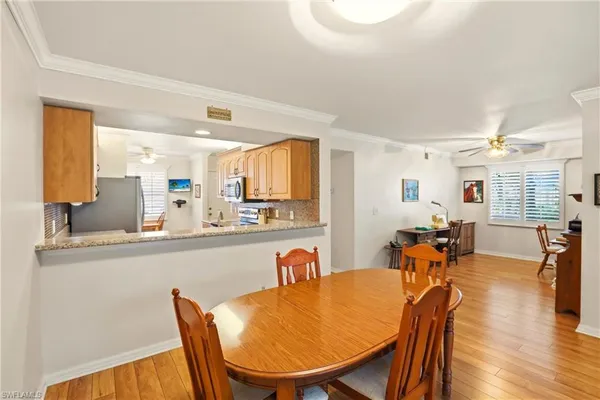 a bedroom with a bed and a dresser in it