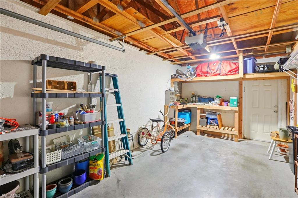 289 Robin Hood Circle, Unit 101 Naples, FL 34104 - Photo 36 of 47 a view of storage and utility room