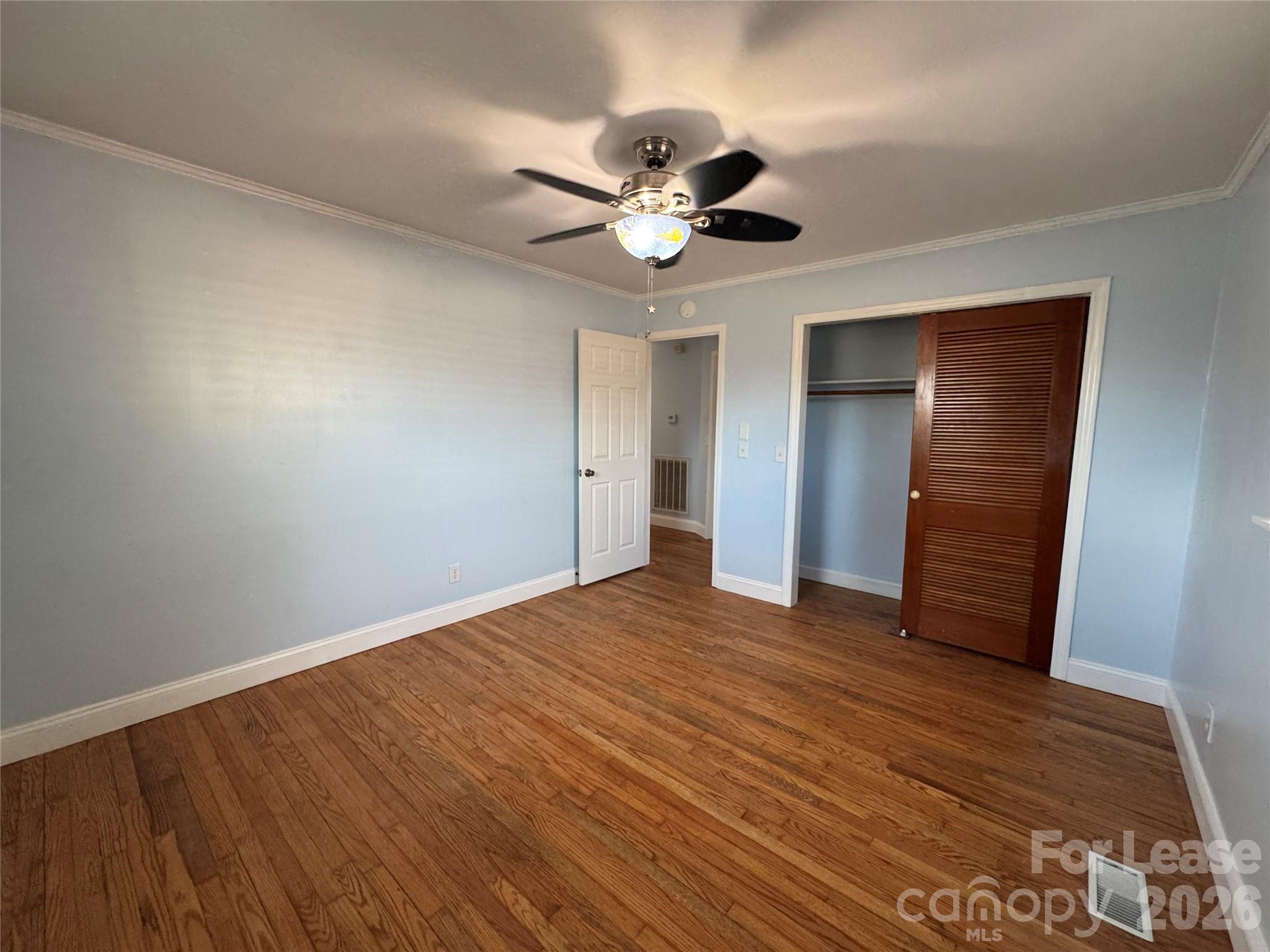 1307 Armstrong Road Belmont, NC 28012 - Photo 12 of 15 a view of empty room with wooden floor